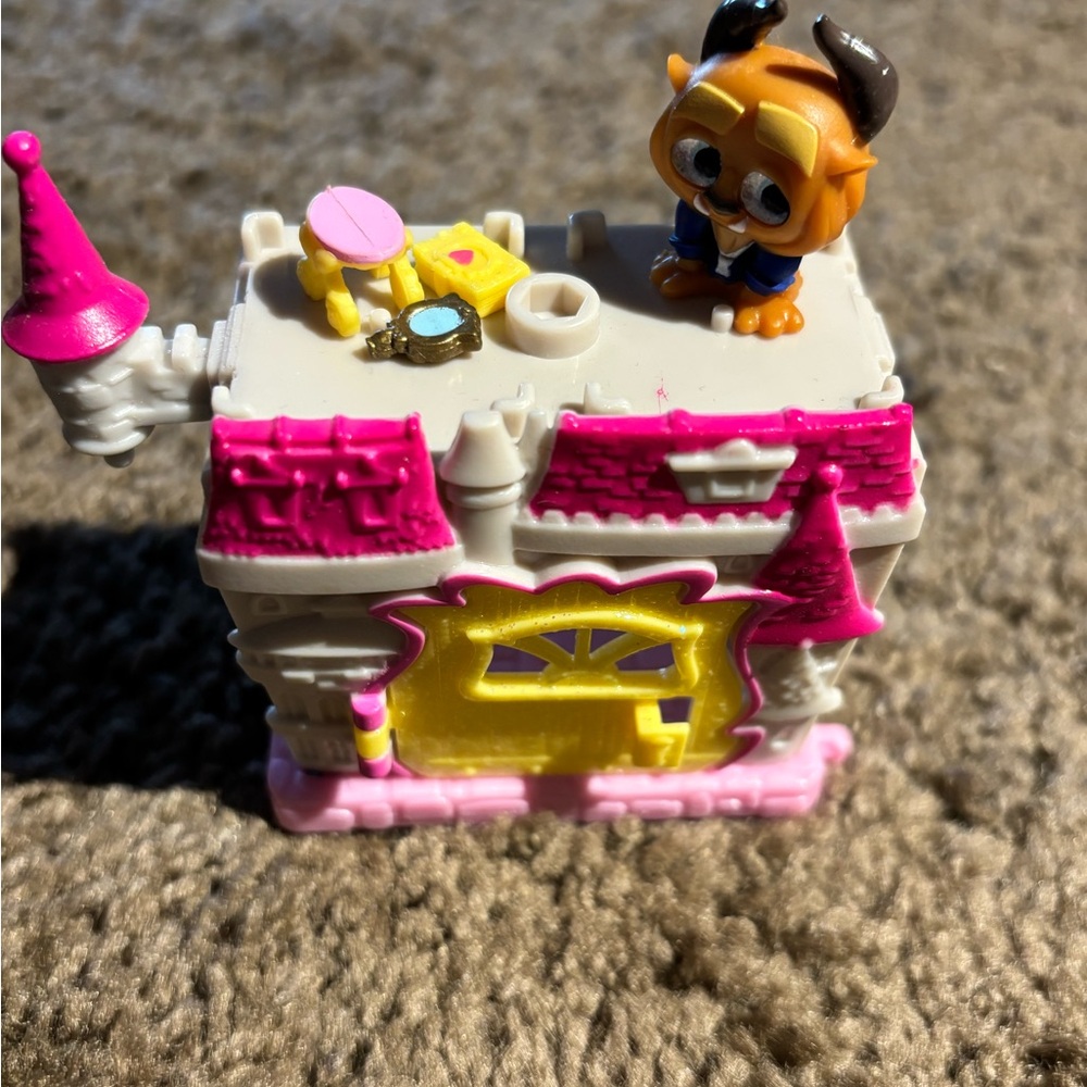 Pink and Yellow Toy Castle with Beast